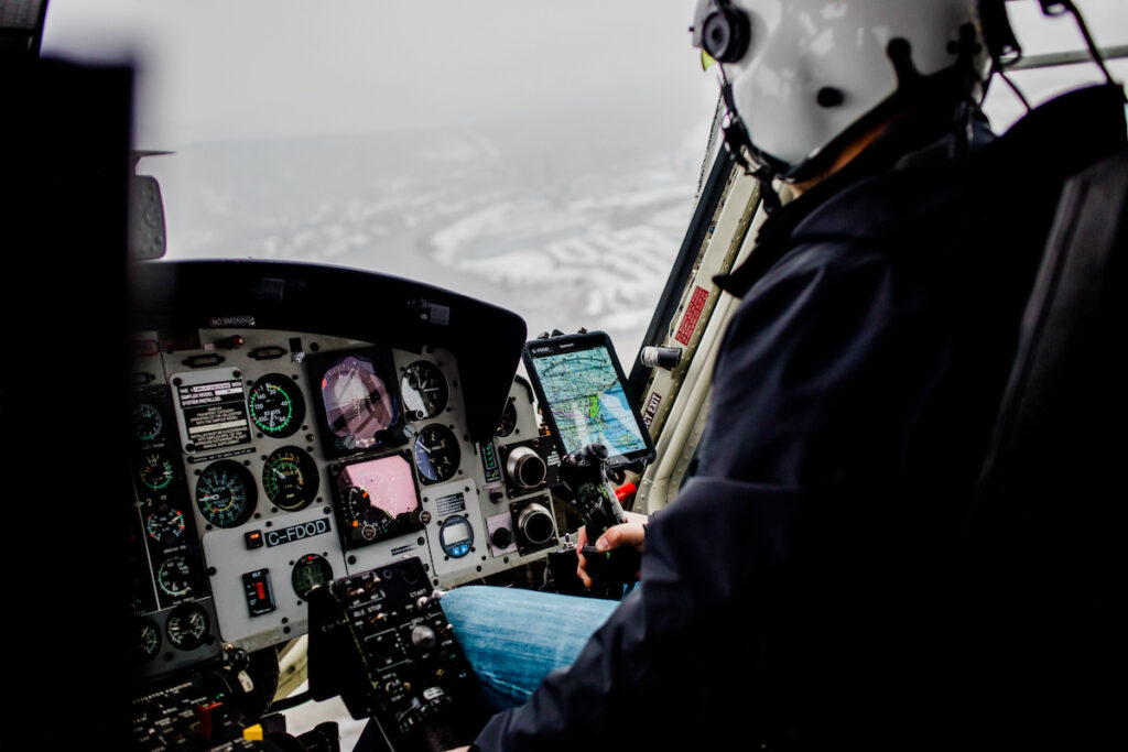 Heli pilot navigates using Cirro maps and charts module